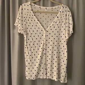 White and black polka dot shirt